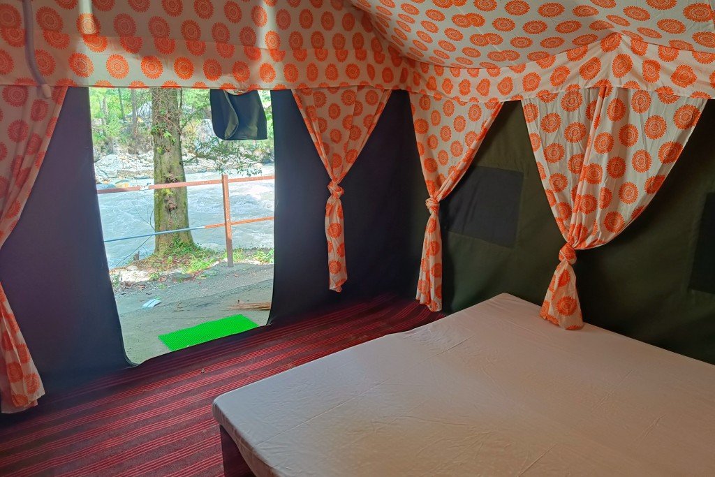 https://www.ngrhotelsandresort.com/Rudraksh Riversite Camping By NGR Hotels